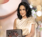 Gunakan Baju Rancangan Designer