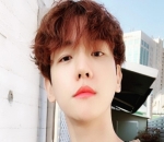 Potret Manis Baekhyun Dengan Gaya Rambut Ikal
