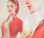 Jihane Kenakan Busana Tradisional