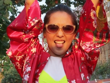 FOTO: Lala Karmela Habiskan Liburan di Bali, Konser Musik Hingga Mandi di Pura