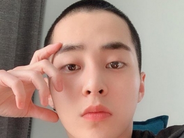 Bersiap Berangkat Wajib Militer, Xiumin Tetap Tampan dengan Gaya Rambut Cepak