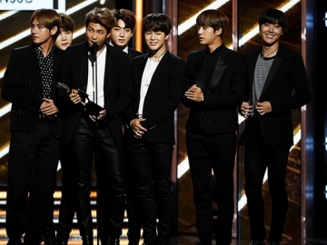 BTS dan Ryan Reynolds 'Deadpool' Saling Follow Akun Twitter, Fans Bantah Media Play