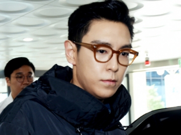 Unggah Foto Ganteng Sambil Tenteng Lukisan Mewah, Netter Malah Sebut T.O.P Alami Depresi