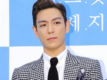 T.O.P Pakai Piyama Polkadot Sambil Rebahan di Kasur, Fans Malah Kepo dengan Sosok Ini
