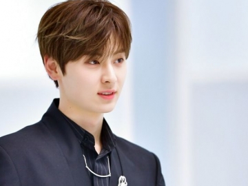 Bintangi Iklan Parfum Terkenal, Gantengnya Minhyun Rebahan Santai di Tengah Padang Lavender