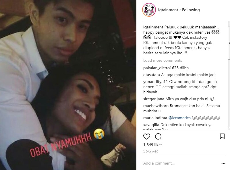 Millendaru Dipeluk Pria Berpakaian Warna Putih