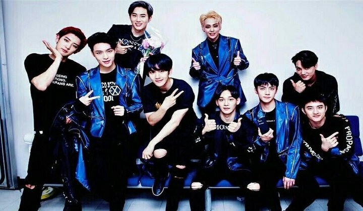 Foto: Bintangi Iklan Kosmetik, Member EXO Bak Tentara Perang dengan Goresan Hitam di Wajah