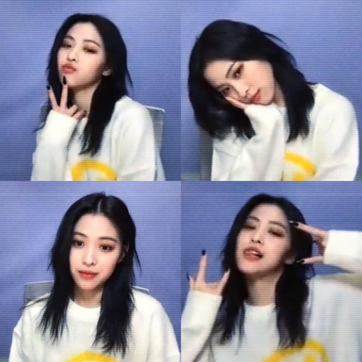 Penampilan Ryujin ITZY dengan gaya rambut berwarna hitam seluruhnya
